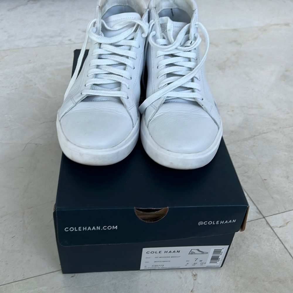 Only wear once . Nice white sneakers . Cole haan
